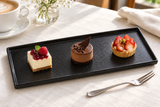11″ × 5¼″ Textured Black Porcelain Stackable Rectangular Plate with an individual dessert presentation; table accessories shown separately