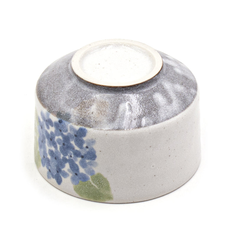 Blue-flower matcha bowl — a contrasting foot beneath the bowl