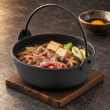 6.75-inch iron nabe pot with sukiyaki on its wood base