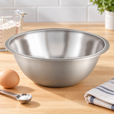 Empty MXB-150Q mixing bowl beside separate measured ingredients and spoon.