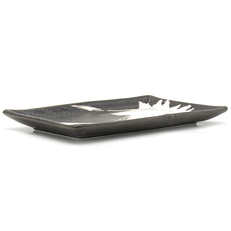 Original low side view of the R285-B plate showing its shallow rim and foot