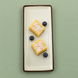 Rect. Plate Cream with Brown Rim — styled view presentation