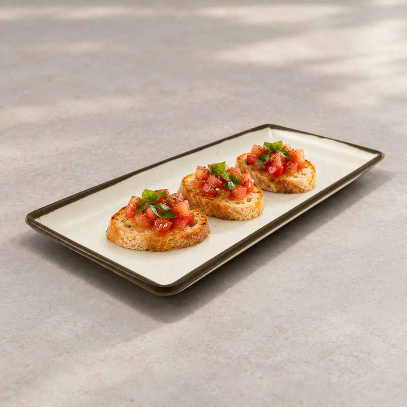 Savory bread bites arranged along the YG-511CB cream and brown-rim plate