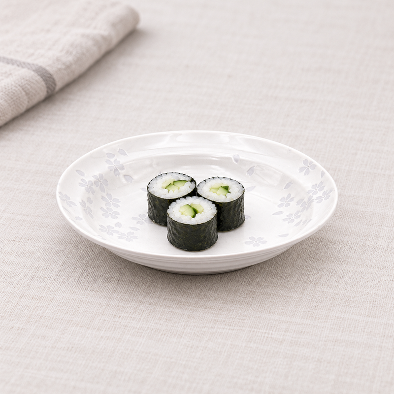 One white Sakura plate from the 15057 ten-piece set with three cucumber maki