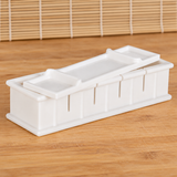 154085 white plastic sushi mold and press on a wooden prep surface