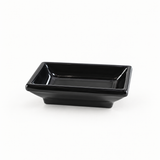 Melamine Rectangular Sauce Dish 3-3/4"x2-1/2", Black. Angled product view.