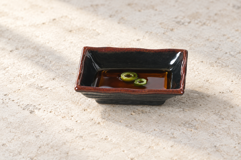 2404TM rectangular Tenmoku wave sauce dish with dipping sauce and scallion rings