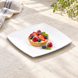 White 29010WT square melamine plate serving a small fruit tart