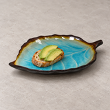 8" x 5.5" x 1"H LEAF PLATE (Tur) — serving context
