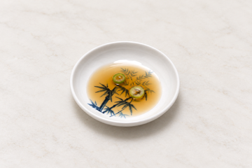 Melamine Round Sauce Dish 3-1/4", Bamboo. Serving suggestion.