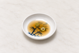 Melamine Round Sauce Dish 3-1/4", Bamboo. Serving suggestion.