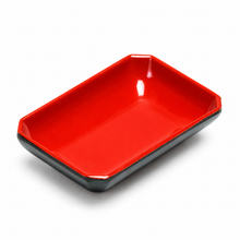 311-BR: Melamine Rectangular Sauce Dish 3-5/8"x2-1/2", Black/Red. Angled whole-product view