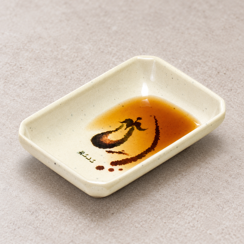 Amber dipping sauce inside the 311-E Eggplant melamine dish