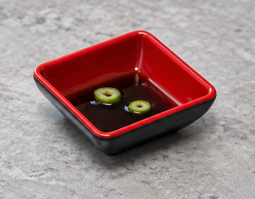 334-BR: Melamine Square Sauce Dish 3", Black/Red. Restaurant serving context