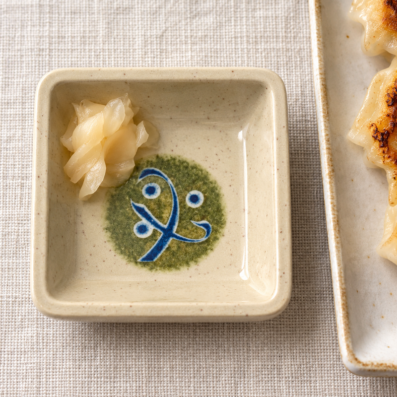 334-M beige and green melamine sauce dish with food