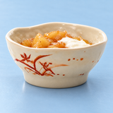 4-1/4" Melamine Round Wave Rice Bowl, Gold Orchid, Styled view