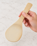 40-M bamboo spatula held to show its handle and working face