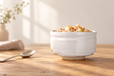 4313-H01: Pear and cinnamon oatmeal on a warm wood tabletop.
