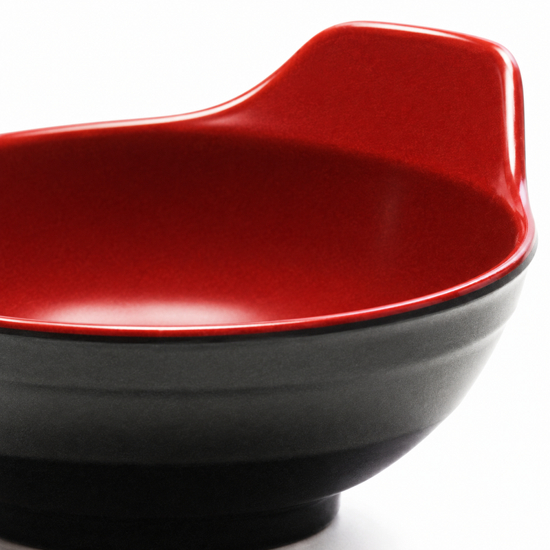 Close-up of the raised back extension on the black and red tempura sauce bowl.