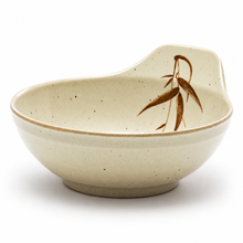 Angled raised-back sauce bowl