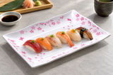 513-CB Sakura melamine plate presenting a realistically sized restaurant serving
