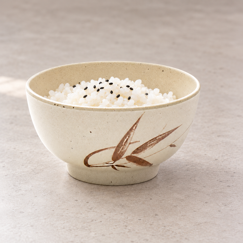 Autumn Grass melamine bowl holding white rice topped with black sesame.