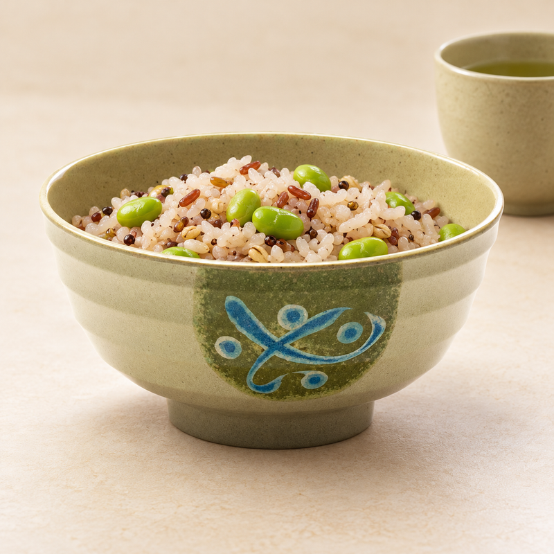 607A-M bowl filled with mixed rice and edamame, with a separate cup behind it.