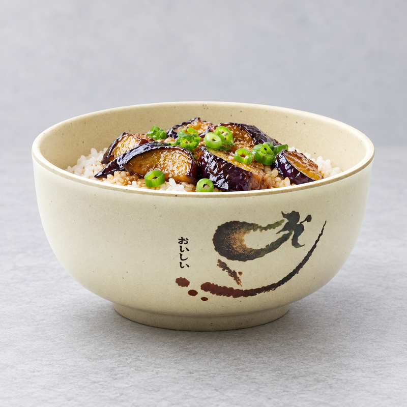 Round Eggplant bowl holding rice topped with eggplant and scallions.