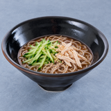 7.75" D x 3.75" H Porcelain Noodle Bowl, Black (YUZUKUROTENMOKU), Styled view