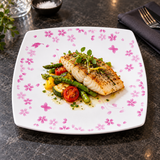 810A-CB Sakura melamine plate presenting a realistically sized restaurant serving