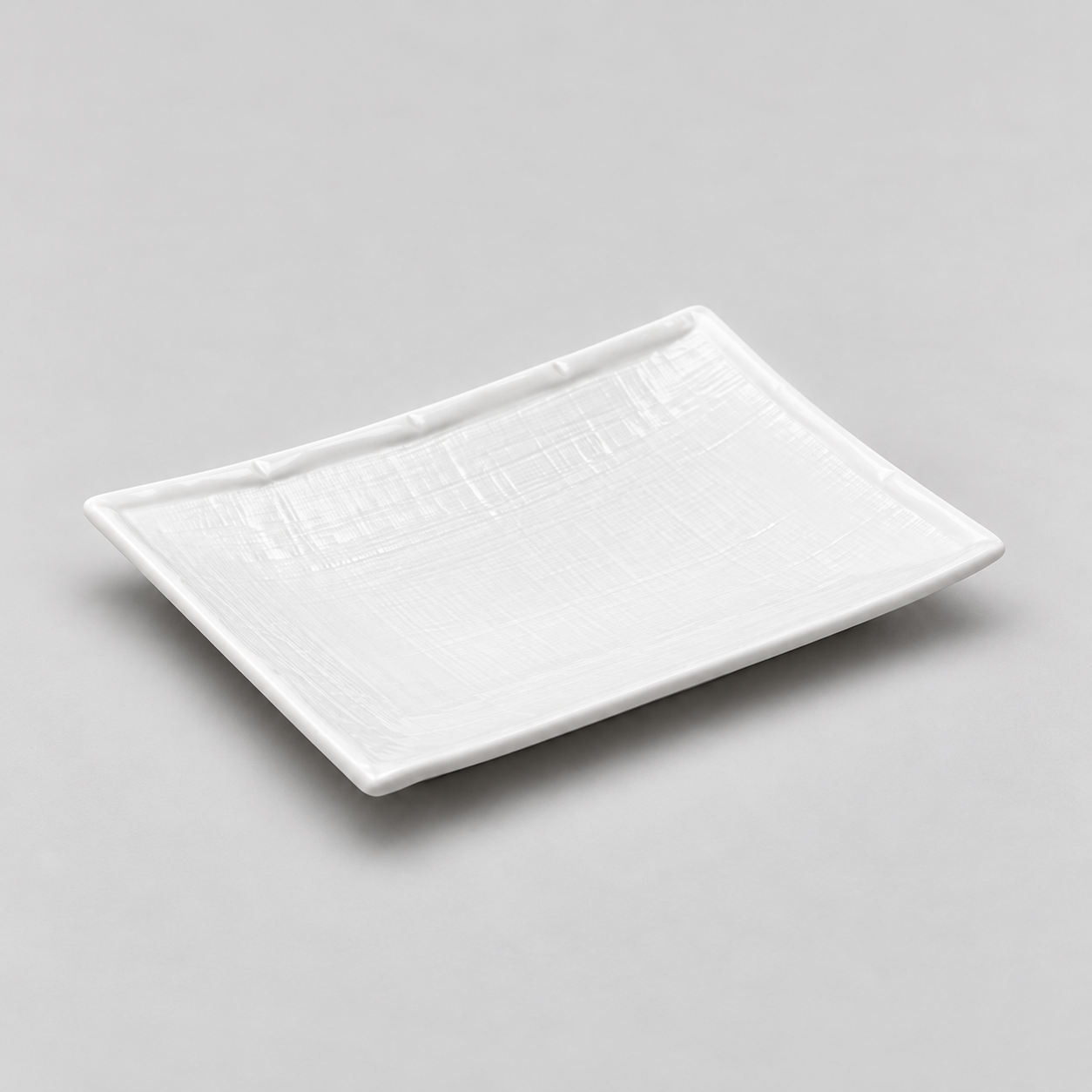 7"x5" Rectangular Plate, White Ceramic. Angled product view.