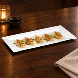 A095-01 white serving plate with a modest food serving
