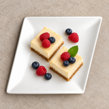 A12556 white angled plate with cheesecake and berries