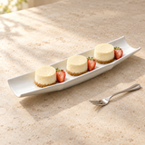 15-1/2" Bamboo Plate, White Ceramic. Cheesecake serving suggestion.