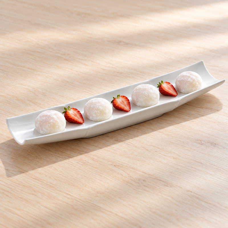 A17066 white ceramic bamboo-shaped platter with mochi and strawberries.