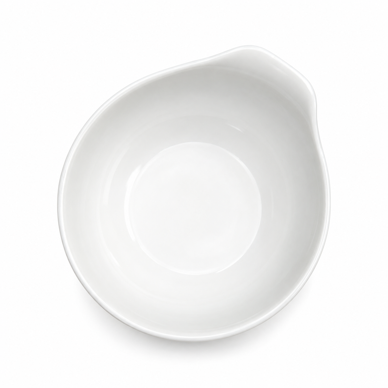 A2315 white ceramic bowl viewed from above, showing its rounded well and broad raised lip along one side of the rim.