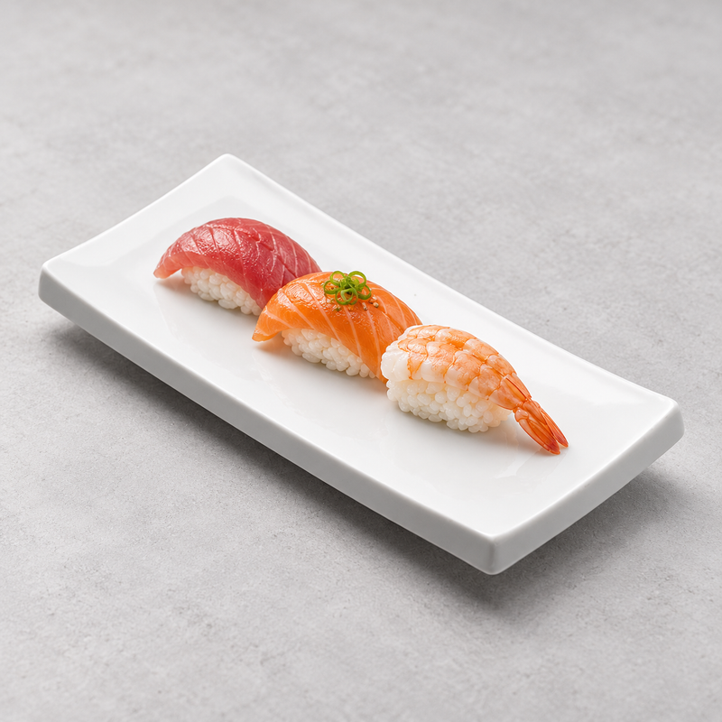 Serving suggestion with tuna, salmon and shrimp nigiri arranged along the A2526 white rectangular plate