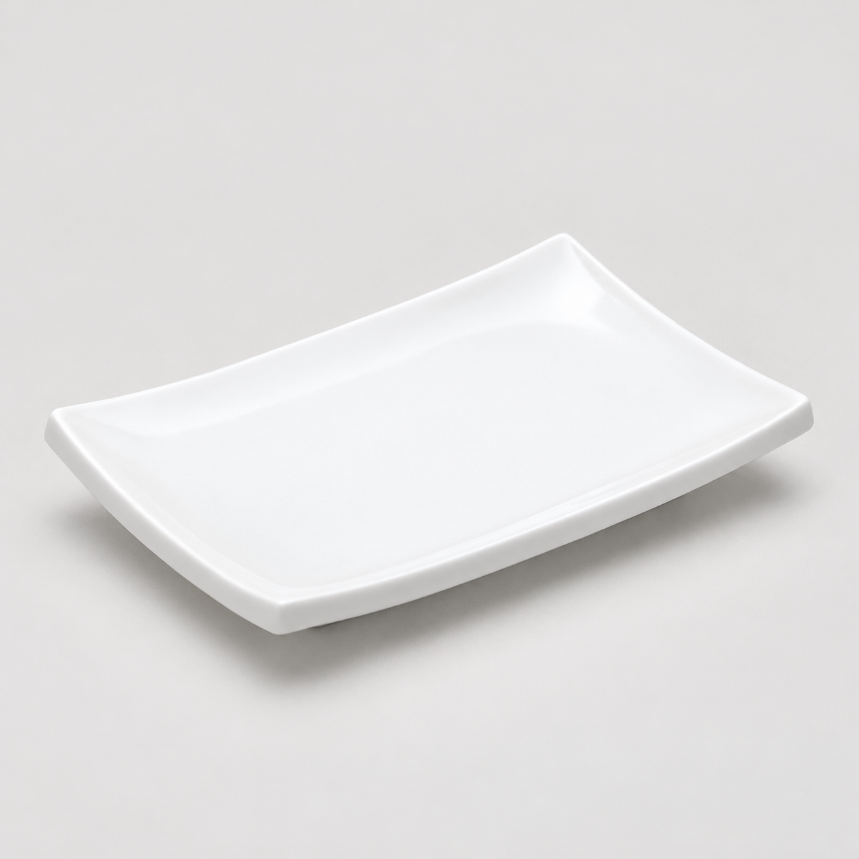 5-7/8"x4" Rectangular Plate, White Ceramic. Angled product view.