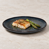 9" Obsidian Ceramic Round Plate with a restaurant serving