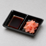 4"Lx2-3/4"W Twin Sauce Plate, Black Ceramic. Serving suggestion.