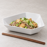 8.5"X2"H Irregular Plate, White Ceramic. Serving suggestion.