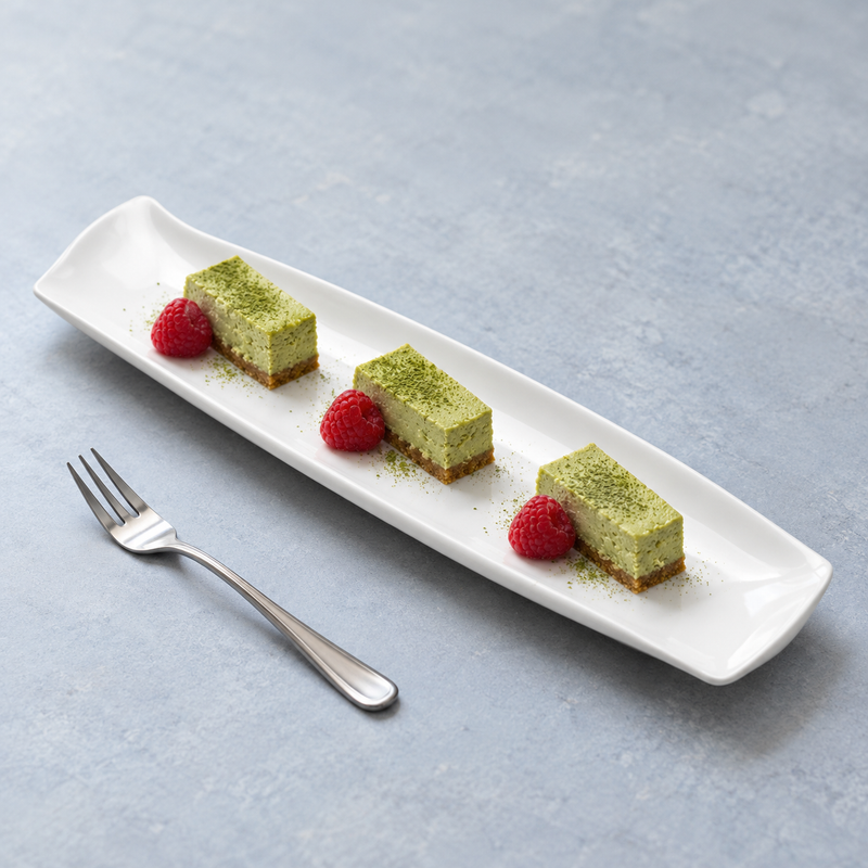 A4551 white rectangular plate presenting small dessert portions and fruit