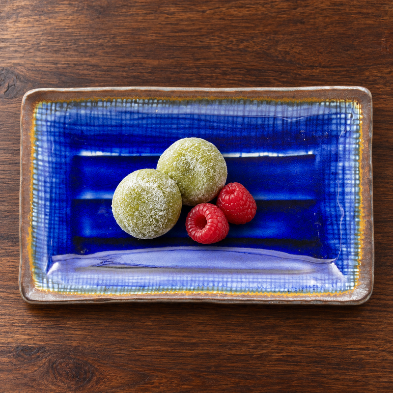 AS285-SP sapphire rectangular ceramic plate with matcha mochi and raspberries