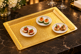 AST-2G gold snake-textured acrylic display tray with small canapés on separate white dishes, serving suggestion