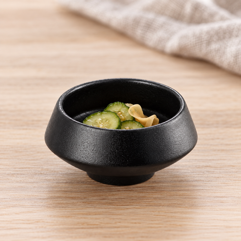 BK-3092 black porcelain bowl with a small cucumber and ginger portion