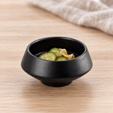 BK-3092 black porcelain bowl with a small cucumber and ginger portion