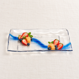 Clear blue-streak rectangular platter with small fruit groups on pale linen