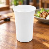 C318-01 plain white handleless cup on a restaurant table