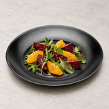YG-812MB: Melamine Round Plate 12.5”, Matte Black. food-service context