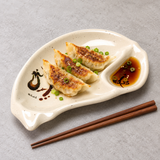 E09-E: Melamine Half Moon 2-Compartment Plate 8-1/2", Eggplant. Restaurant serving context